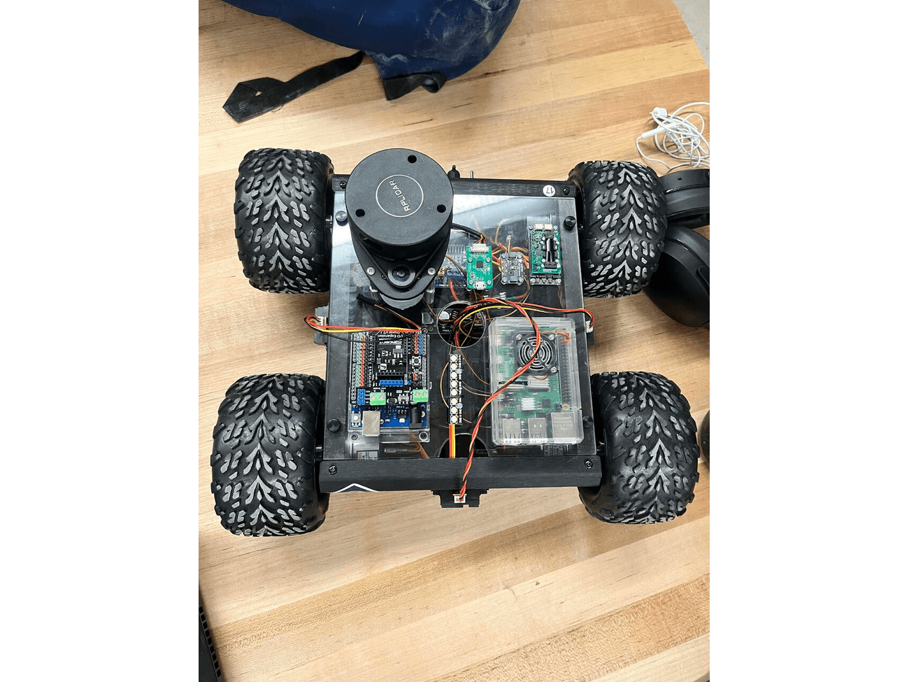 Top-down view of the rover chassis with LiDAR unit and onboard electronics mounted