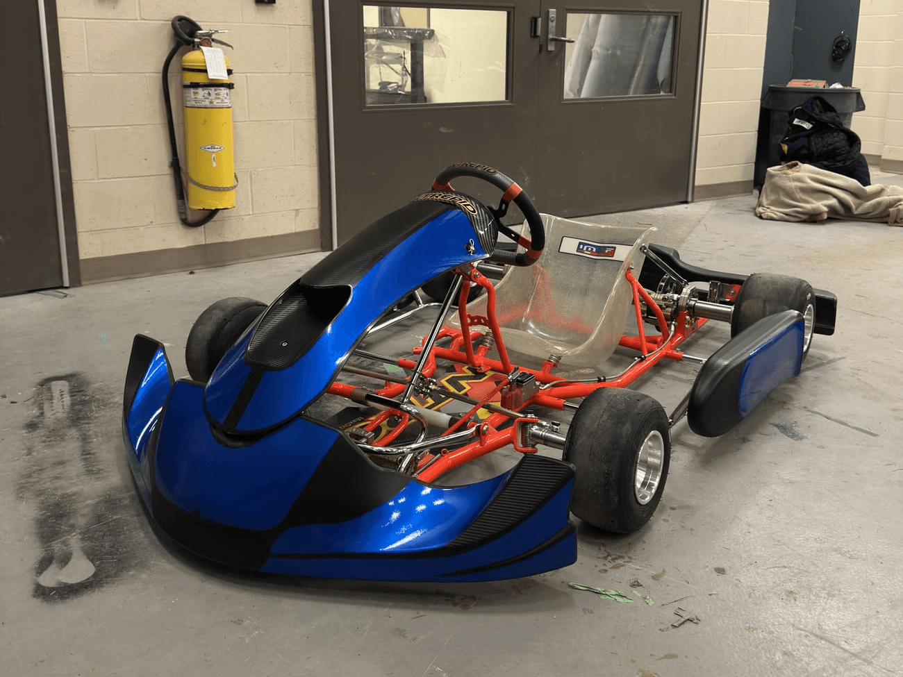 Go-kart chassis with only the front and side bumpers mounted, before the rest of the electric conversion